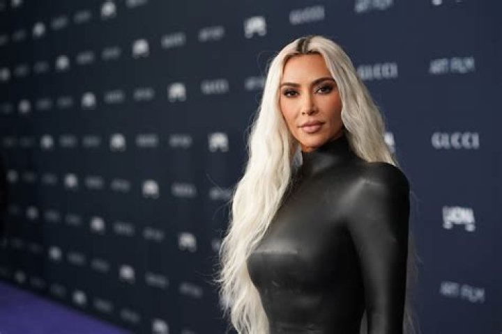 Kim Kardashian Rocks Undone Hair & Pale Nude Lips For ‘ELLE’ France