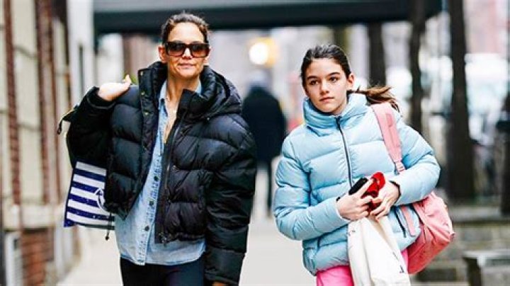 Suri Cruise, 16, Flashes A Big Smile As She & Mom Katie Holmes Jet Out Of NYC After Christmas